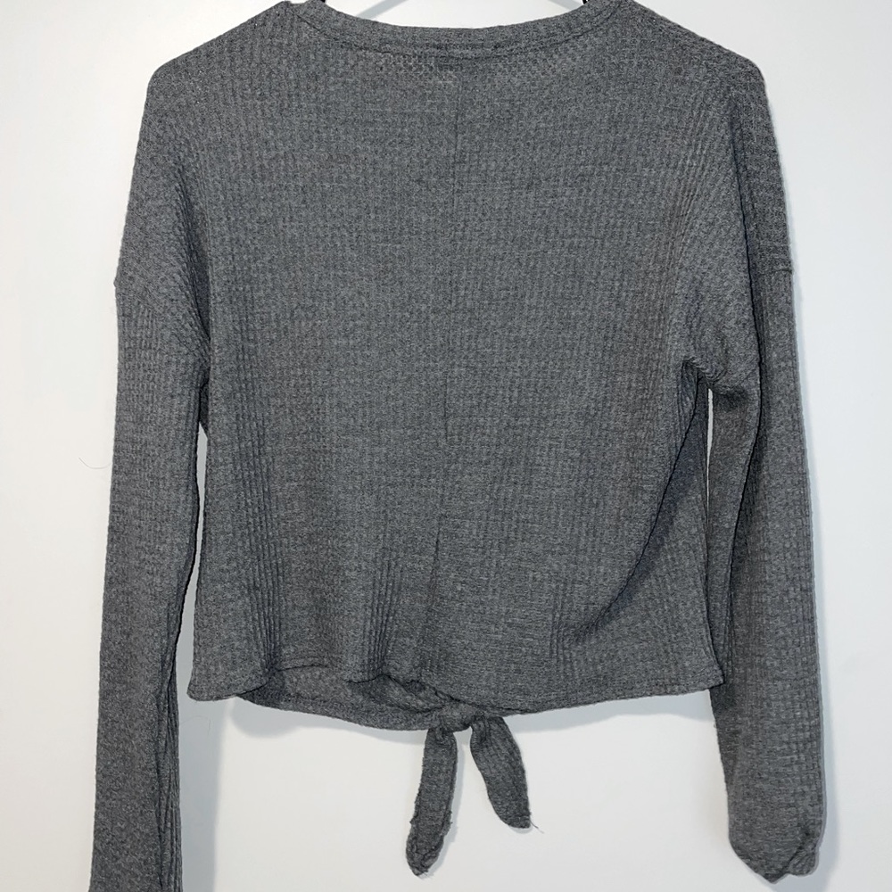 Grey tied sweater